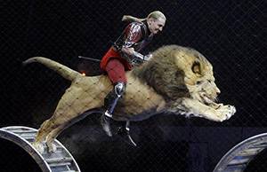 Riding-a-lion_1373630i.jpg