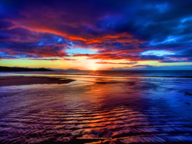 Free-beautiful-wallpaper-of-a-sunset-over-the-beach-at-red-point-on.jpg