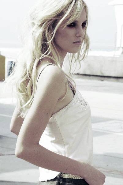 Strong_Blonde_by_ArchangelX10thang.jpg