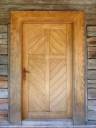 rsz_wooden-door-and-wood-planks-wall-1.jpg
